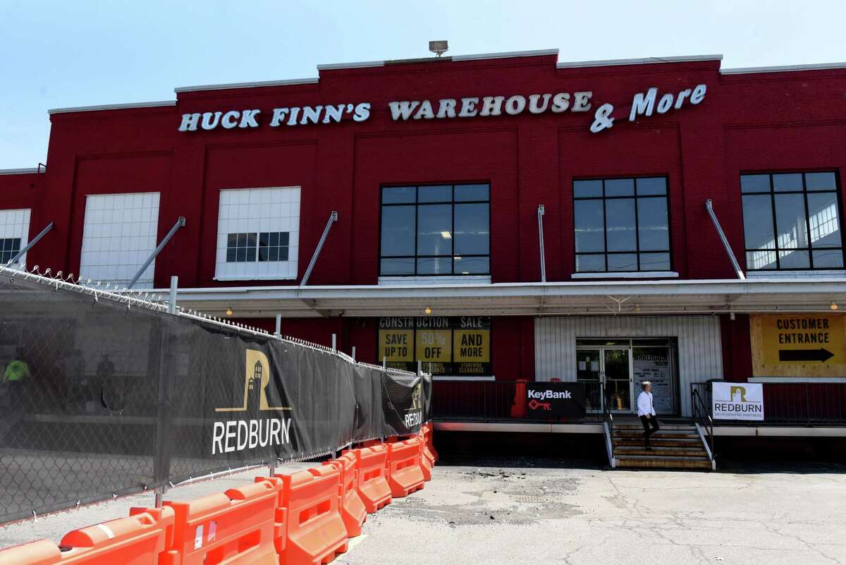 Exterior of the Huck Finn's Warehouse property that Redburn Development Partners are transforming into a mixed use apartment project, named Slip 12, on Wednesday, May 25, 2022, on Erie Blvd. in Albany, N.Y. The $65 million project will include more than 260 market-rate apartments with indoor and outdoor amenities, in addition to 45,000 sq. ft. of commercial space in the former furniture warehouse.