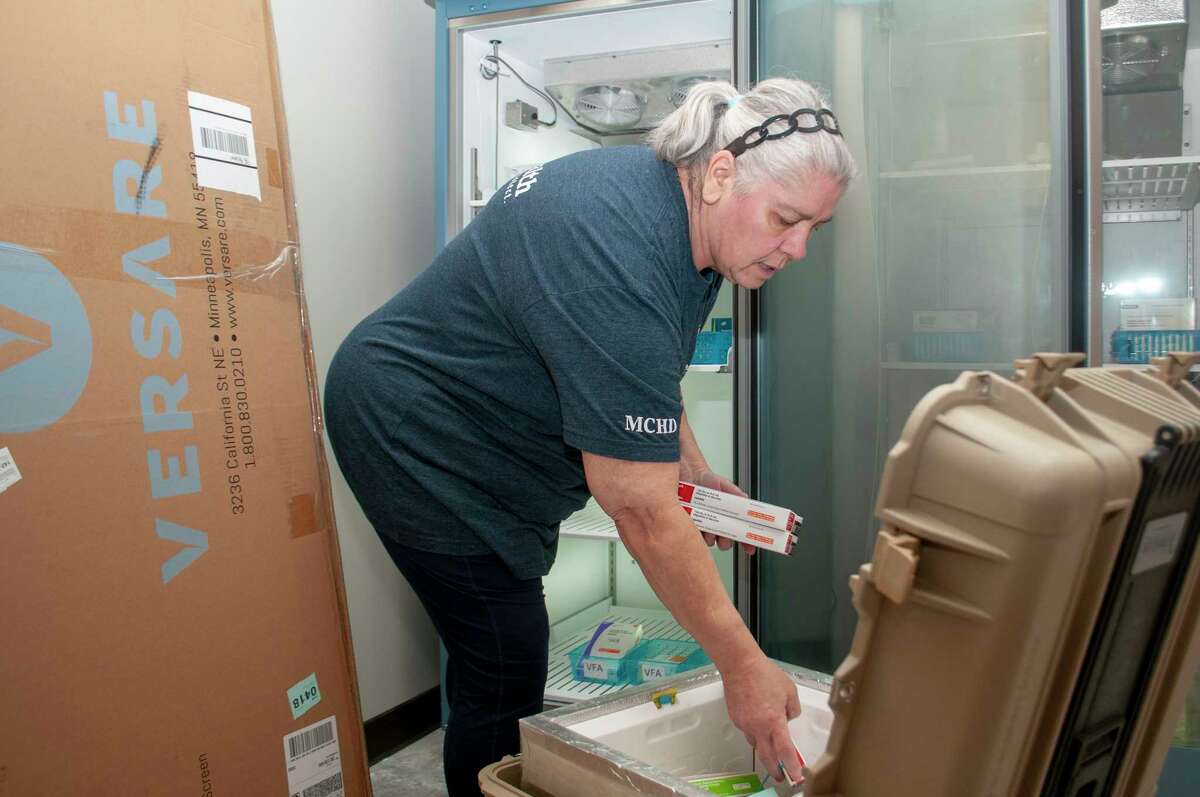 Jana Hassebrock, immunization nurse for Morgan County Health Department, loads vaccines into temperature-controlled refrigerators at the health department's new home at 425 E. State St. The department will be open for business in its new space starting Wednesday. The health department administers more than 11,000 vaccines each year, in addition to COVID-19 vaccines. 