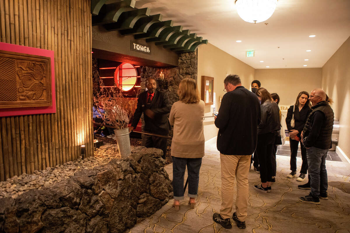 People wait in line to enter the Tonga Room in the Fairmont Hotel, in San Francisco, Calif. on May 20, 2022.