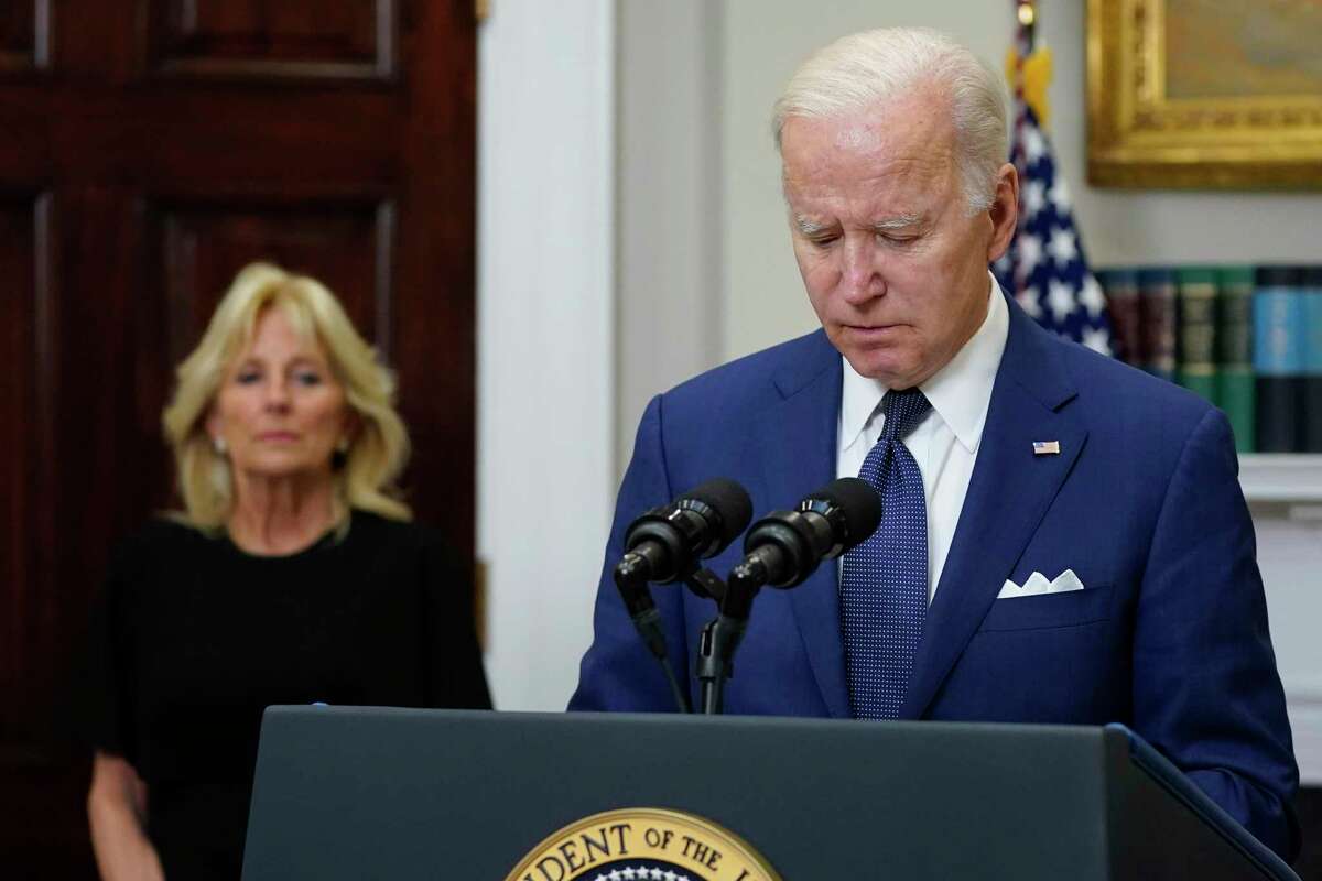 President Joe Biden pauses as he speaks about the mass shooting at Robb Elementary School in Uvalde, Texas, from the Roosevelt Room at the White House, in Washington, Tuesday, May 24, 2022, as first lady Jill Biden listens. (AP Photo/Manuel Balce Ceneta)