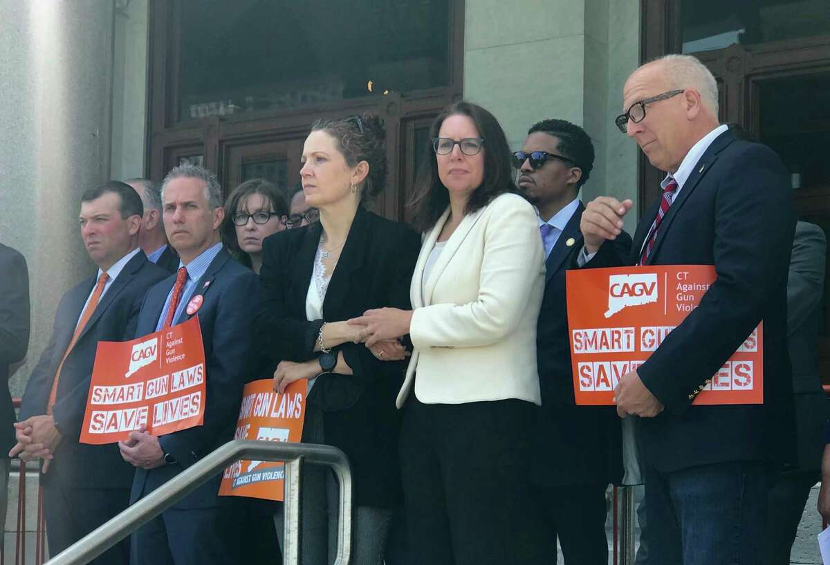 Democrats in the General Assembly and other advocates for gun violence prevention held a rally at the state Capitol in Hartford Wednesday. At center are Rep. Aimee Berger-Girvalo, D-Ridgefield, and Rep. Kate Farrar, D-West Hartford.