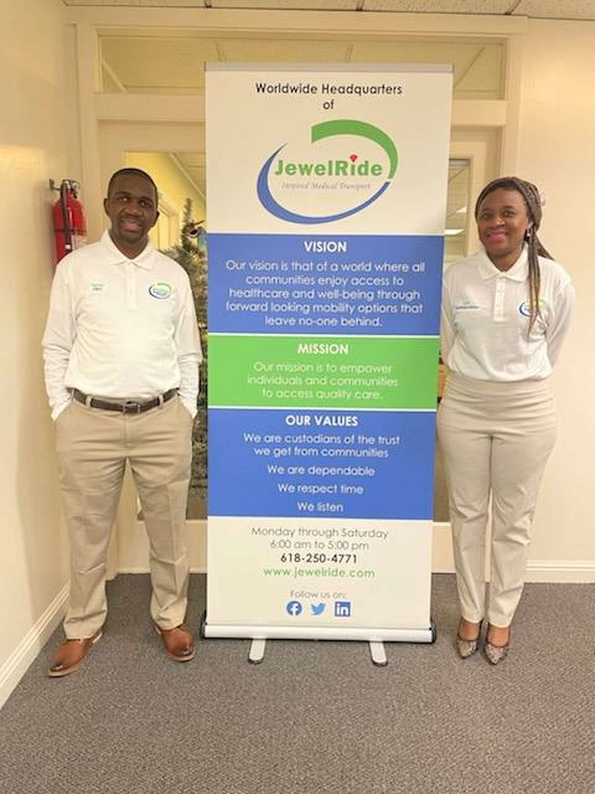 Tapiwa Mupereki, right, and his wife, Faith Nkomo, at the headquarters of their company, JewelRide, in Edwardsville. Mupereki is the sponsor of JewelRide Books for Bikes, a new summer reading program at Edwardsville Public Library that will give away 14 bicycles as prizes.