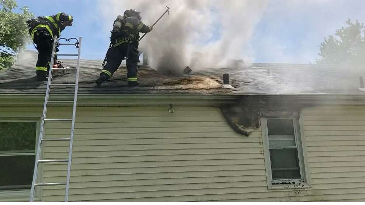 Firefighters rescued a family dog while working on a house fire on Colonial Drive Wednesday afternoon.