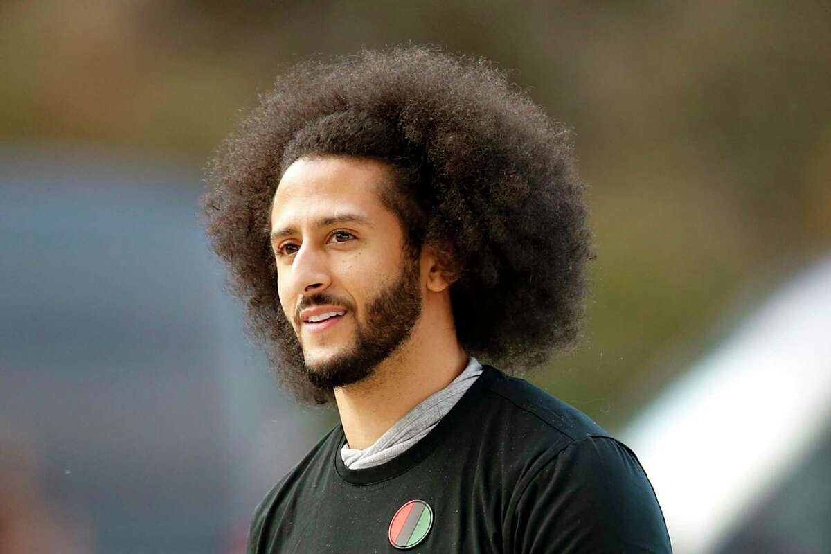 Free agent quarterback Colin Kaepernick arrives for a 2019 workout for NFL football scouts and media in Riverdale, Ga.