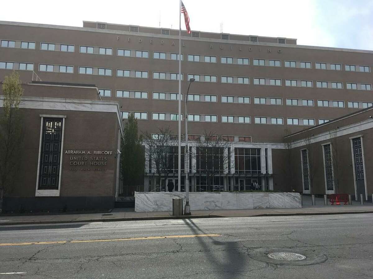 The Abraham Ribicoff Federal Building and United States Courthouse on 450 Main St. in Hartford. A Bristol man previously convicted of burglary, home invasion and assault offenses pleaded guilty Tuesday to unlawfully possessing a firearm Tuesday.