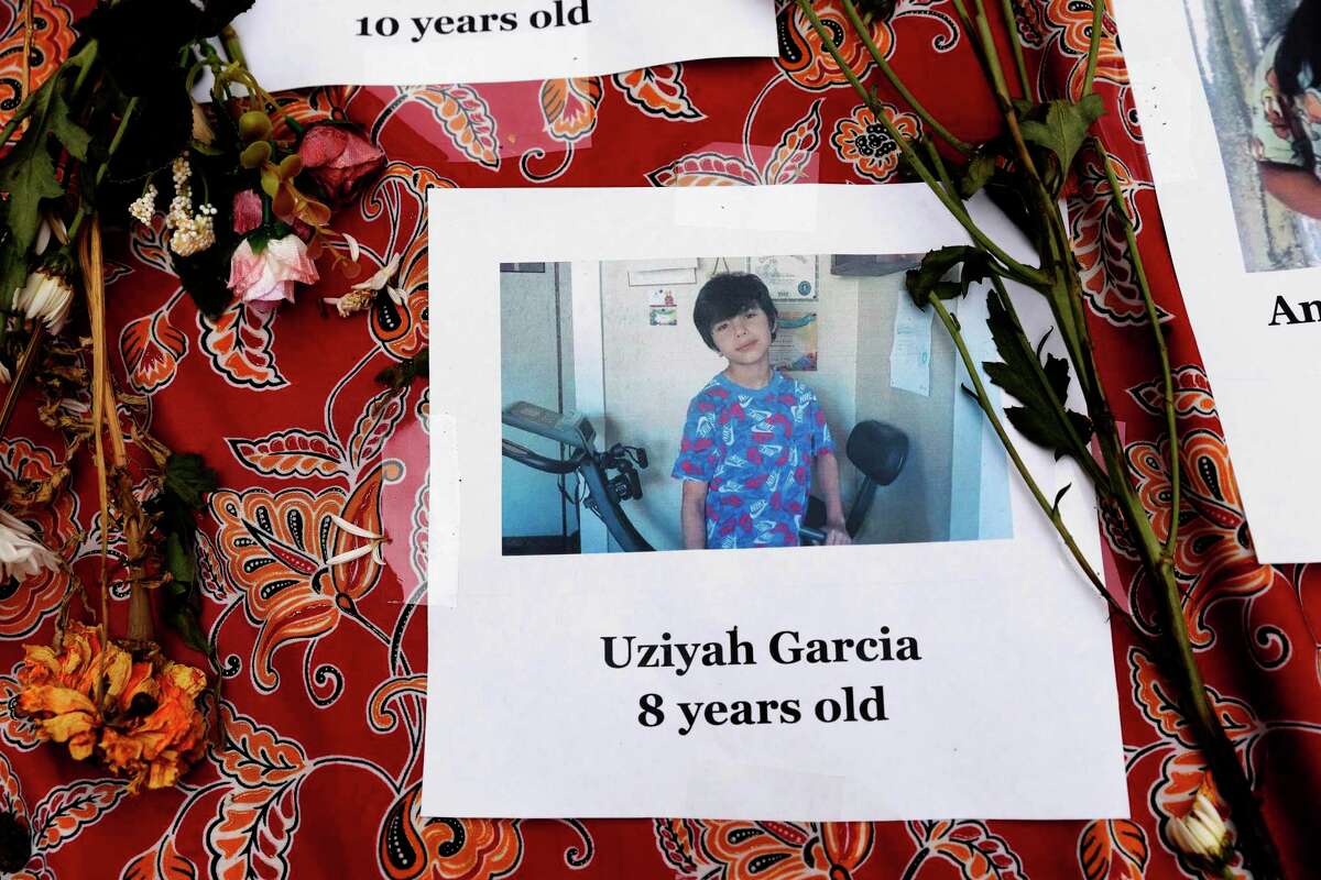 A part of a memorial to the victims of the Texas school shooting created by students and staff at Abraham Lincoln High School incudes an alter with a photo of Uziyah Garcia, 8, on Wednesday, May 25, 2022 in San Francisco, Calif.