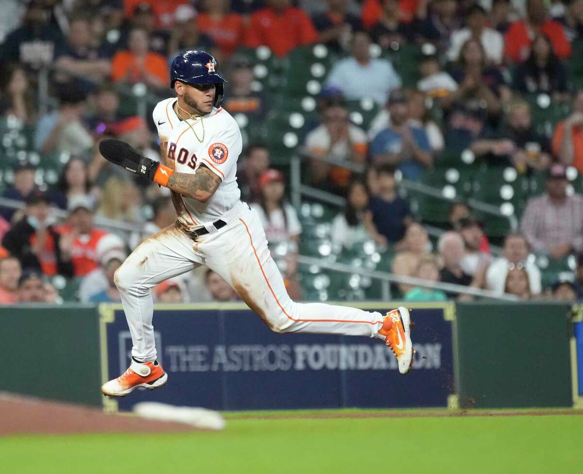 Houston Astros Jose Siri (26) takes third base on a throwing error by Cleveland Guardians starting pitcher Cal Quantrill during the third inning of an MLB game at Minute Maid Park on Wednesday, May 25, 2022 in Houston.