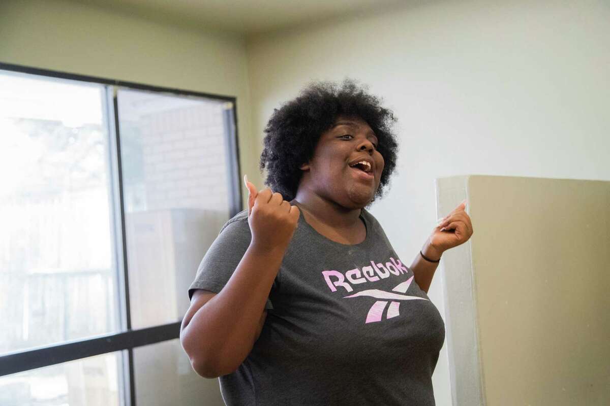 Covenant House Texas resident Kenicia sings during a rehearsal, Tuesday, May 24, 2022, in Houston, for an upcoming performance at The Wortham Theater with the help of Broadway Inspirational Voices mentors. Broadway Inspirational Voices, is a diverse group of artists united to change lives through the power of music and service.