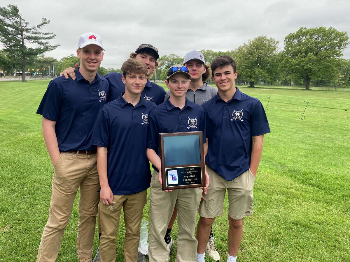 Manistee golf celebrates winning the conference championship on Wednesday afternoon. (From left to right back row: Ben Schlaff, Mitchell Ziehm, and Braydon Sorenson. From left to right front row: Jordan Bladzik, Brady Johnson, and Jacob Sharp)