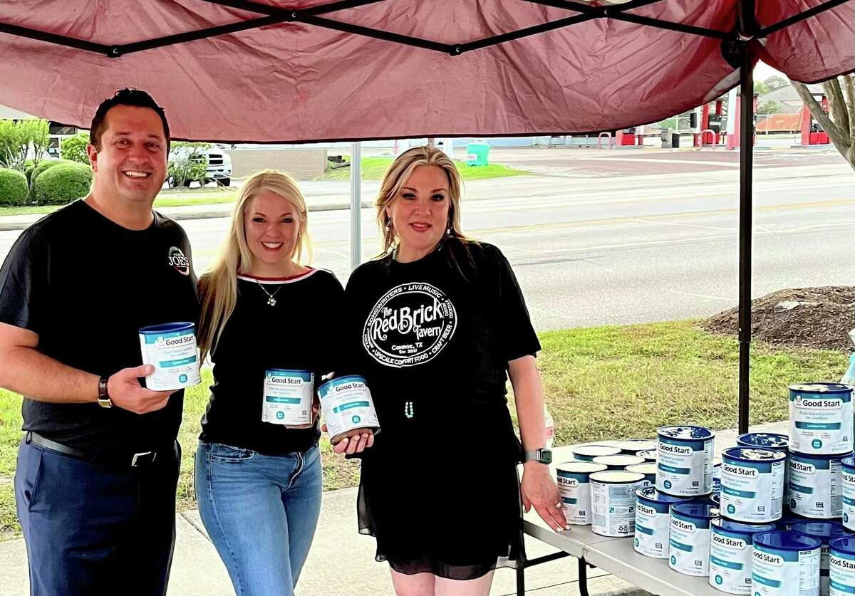 Last week Conroe restaurant owners Debbie Glenn and Joe Haliti were able to secure 80 cans of baby formula to give away to the community. This week they received a shipment of 180 cans that they will be giving away at two locations in downtown Conroe tonight. Pictured from left are Haliti, Echo Hutson and Glenn.