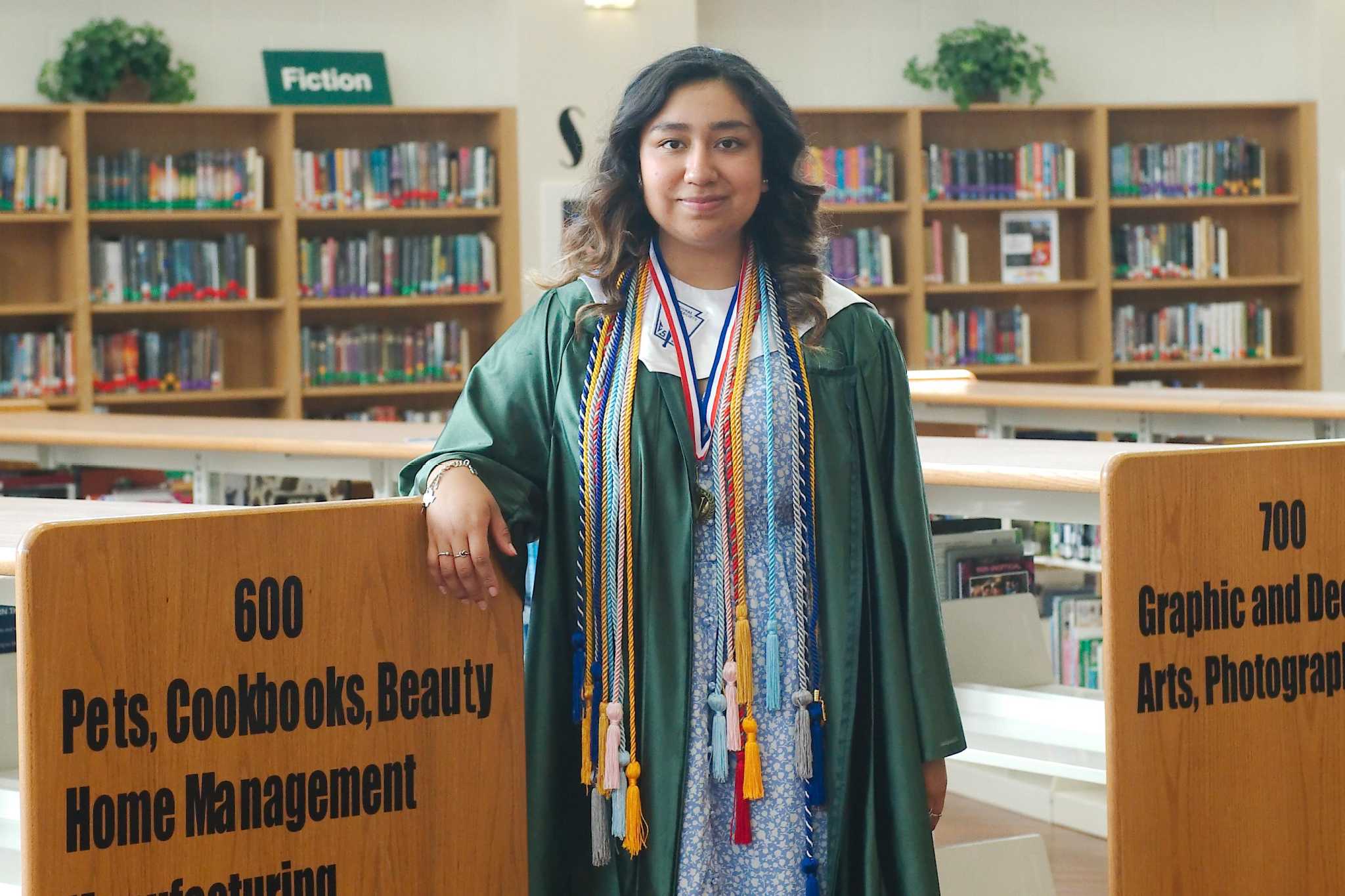 Daughter of immigrants: Graduation a triumph for family's sacrifices