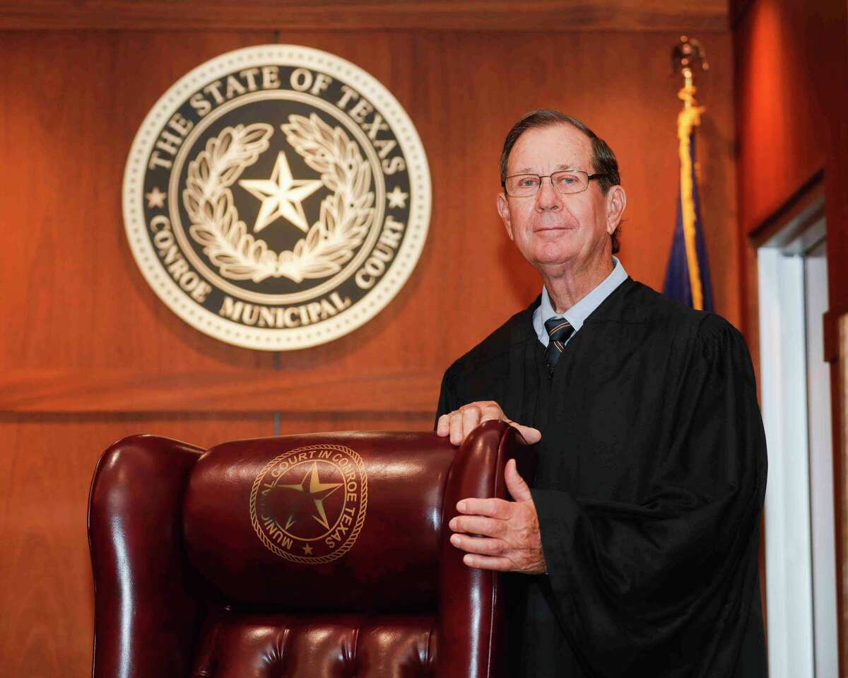 A complaint has been filed with a state agency against retiring Conroe Municipal Judge Mike Davis after he posted a photo to Facebook showing him putting his robe on candidate Will Waggoner in chambers.