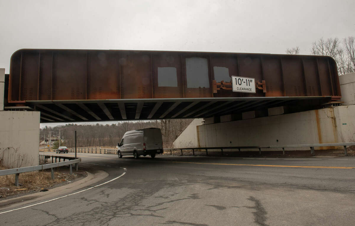 Train bridge over Glenridge Road. The state Department of Transportation has struggled to stem the number of oversized vehicles that hit this bridge.