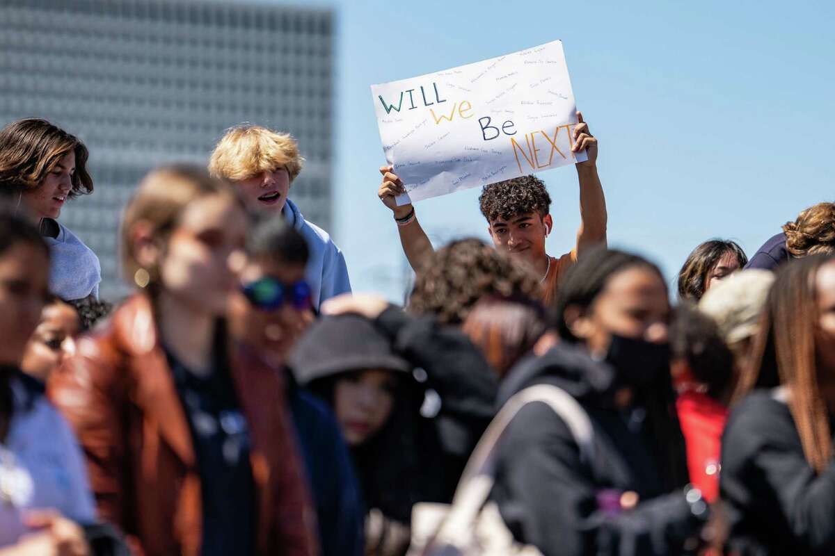A Lamar student holds a sign that reads “Will We Be Next” during a “Walkout for Uvalde,” Thursday, May 26, 2022, at Lamar High School in Houston. Students around the country were encouraged by a national organization to walk out of their classrooms on Thursday at noon eastern time to demand action from lawmakers.
