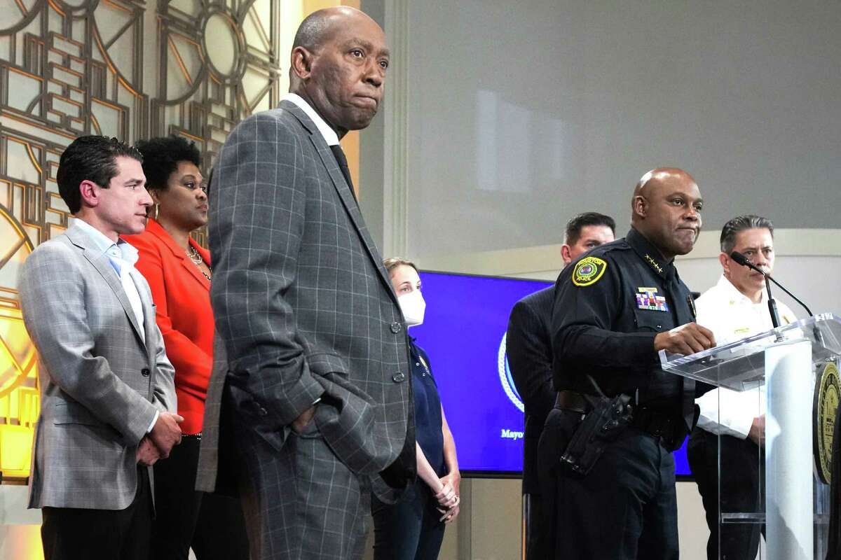 Mayor Sylvester Turner, left, and Houston Police Chief Troy Finner listen to questions during a news conference discussing security planned around the NRA meetings Thursday, May 26, 2022 in Houston. The 2022 NRA Annual Meetings and Exhibits are being held this weekend at the George R. Brown Convention Center.