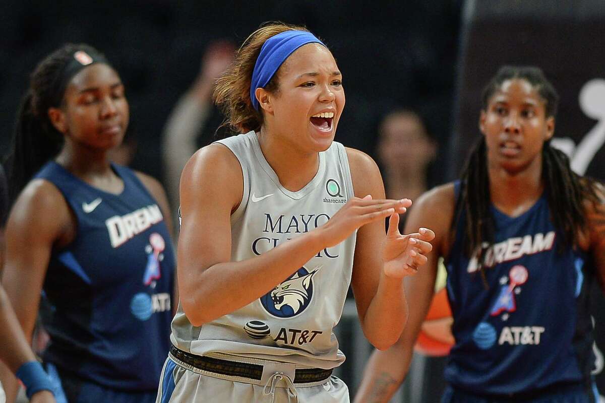 Atlanta, GA August 6, 2019: Nafeesa Collier (24) of Minnesota attends the WNBA game between the Minnesota Lynx and the Atlanta Dream at State Farm Arena in Atlanta, GA on August 6, 2019. React after making a basket while receiving a foul inside.  (Photo by Rich von Biberstein/Icon Sportswire via Getty Images)