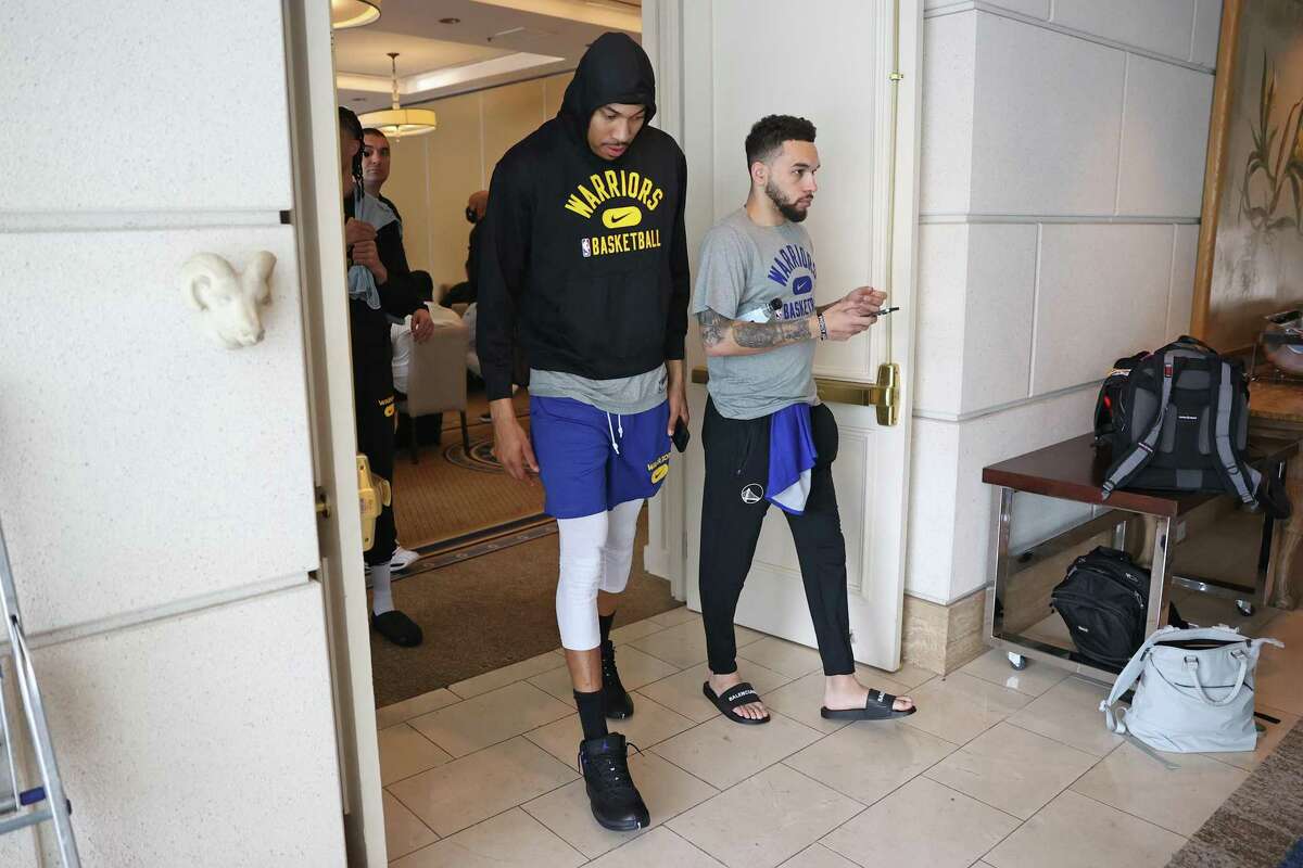 Golden State Warriors’ Otto Porter, Jr. limps out of a team meeting at Hotel Crescent Court in Dallas, Texas, on Monday, May 23, 2022.