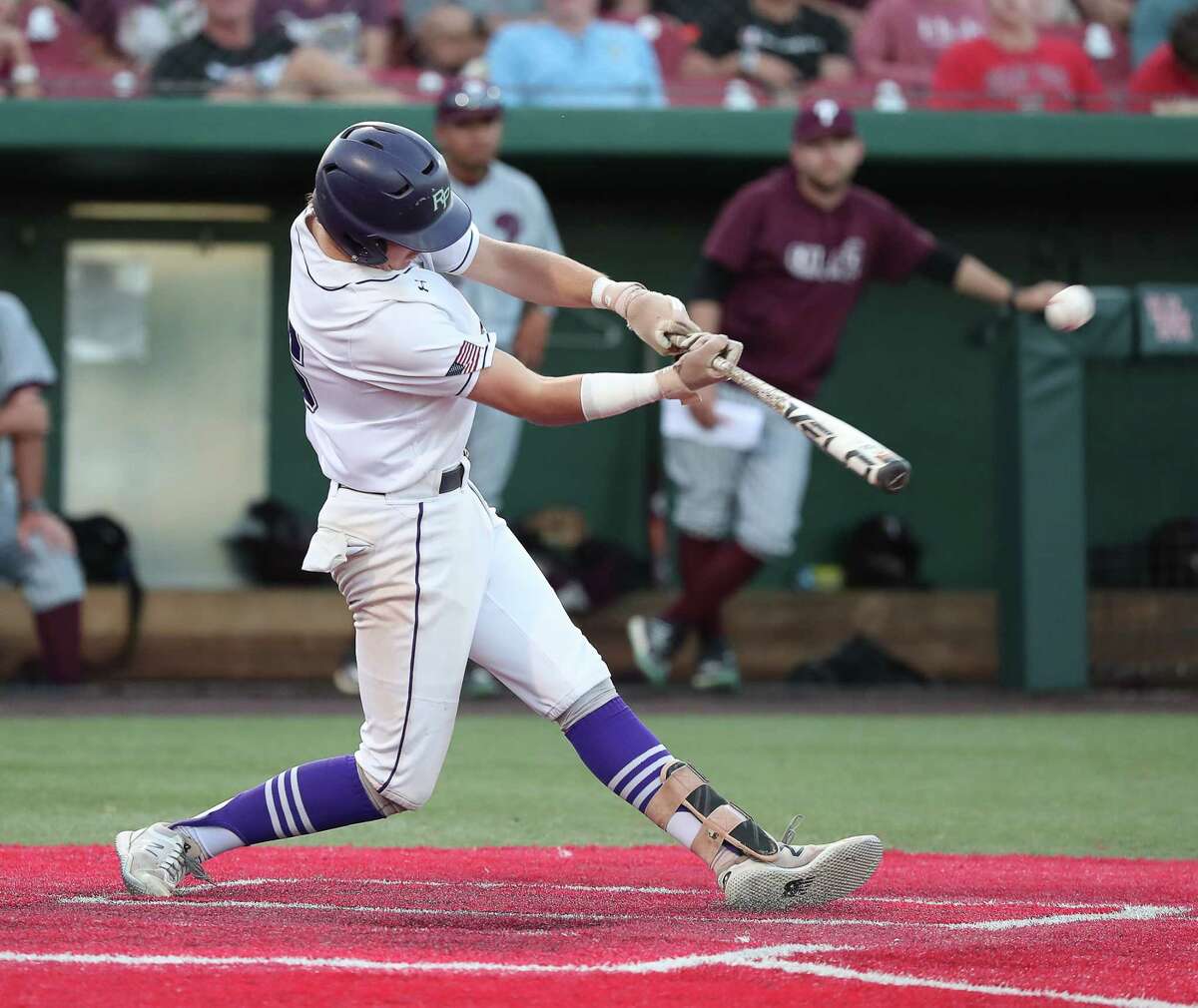 HOUSTON, TX - MAY 26: Ridge Points Travis Vlasek #16 hits a double scoring three runs in the third inning against Pearland during a Region III 6-A semifinals, Game 1 high school baseball game between Ridge Point and Pearland on May 26, 2022 at Schroeder Park on the University of Houston in Houston, Texas. (Photo by Bob Levey/Contributor)