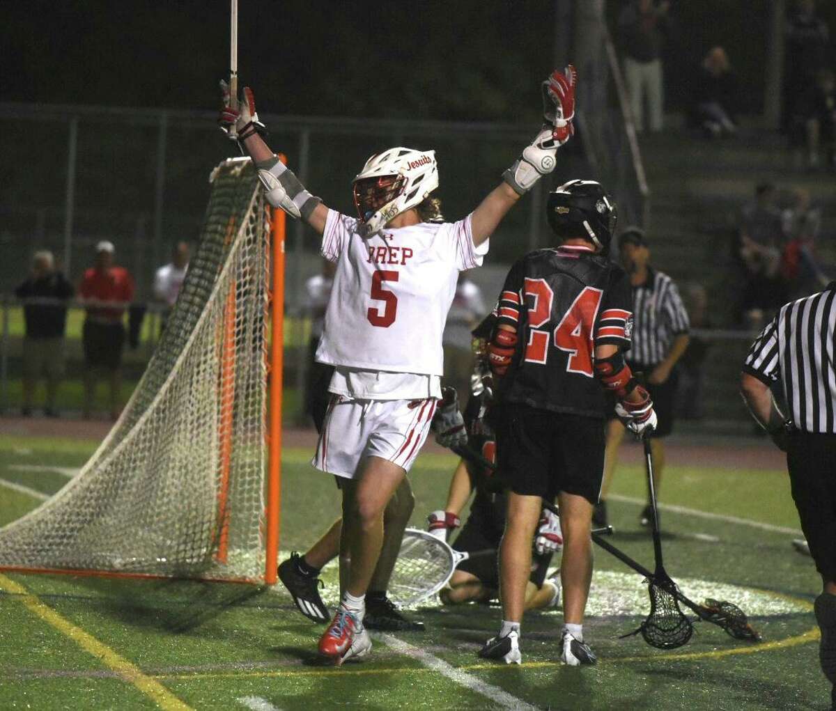 Fairfield Prep’s Luke Shannehan (5) celebrates a goal against Cheshire in the SCC boys lacrosse championship at Ken Strong Stadium in West Haven on Thursday.