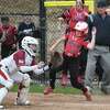 Masuk's Angela King scores ahead of tag by St. Joseph catcher Kelsea Flanagan to give her team a 1-0 lead in the 3rd inning of their girls softball game at St. Joseph High School in Trumbull, Conn., on Thursday, April 21, 2022.