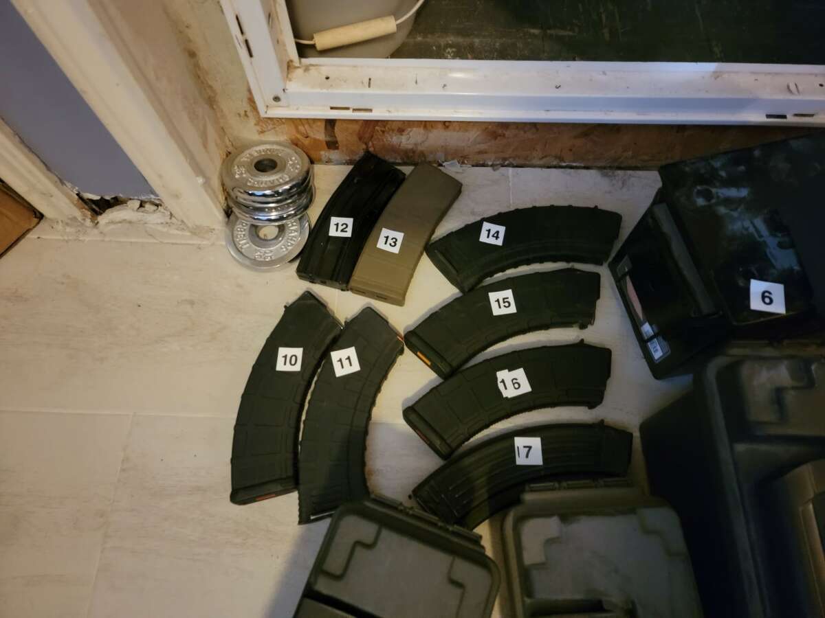 A search of a residence in the 4200 block of Logan Avenue on May 26 yielded several handguns, extended magazines, long rifles, a bullet proof vest with armor plates and hundreds of rounds of ammo found in various parts of the home. A man was arrested in connection with the case after saying that he was going 'human hunting.'