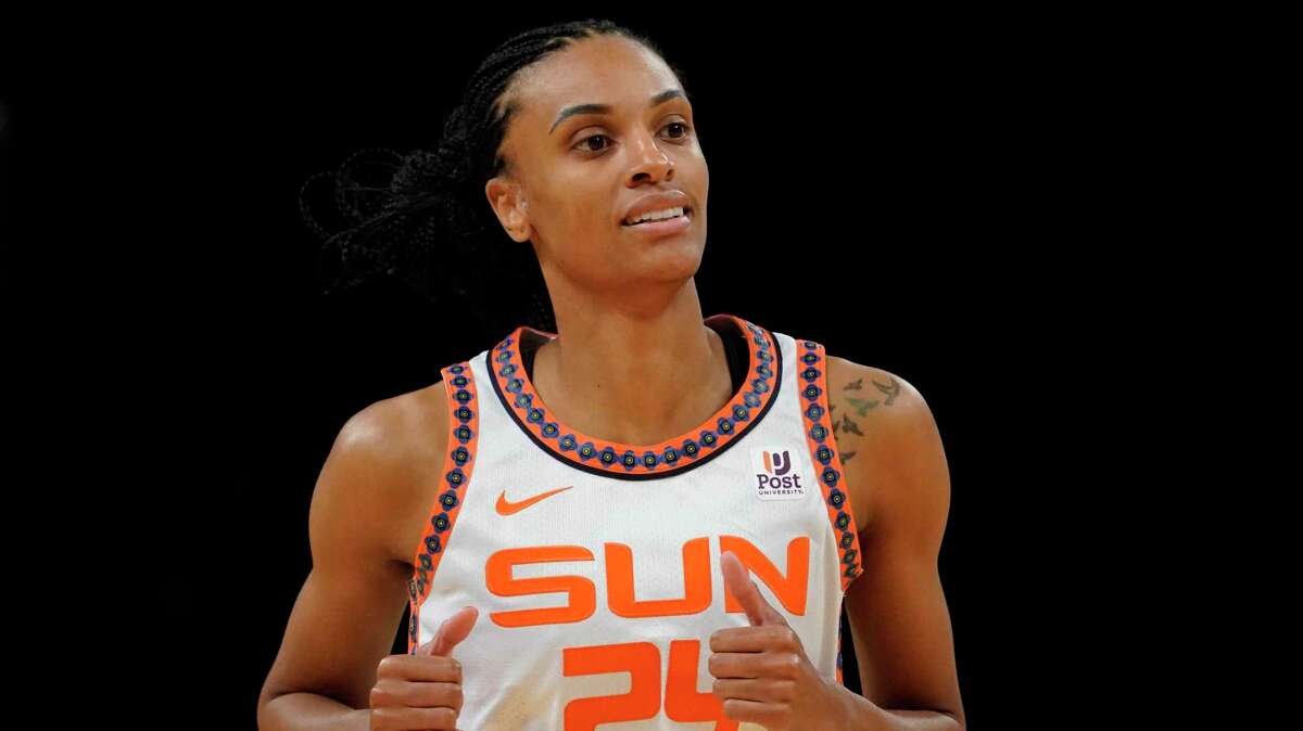 Connecticut Sun forward DeWanna Bonner (24) runs up the court in the first half during a WNBA basketball game against the New York Liberty, Tuesday, May 17, 2022, in New York. (AP Photo/John Minchillo)