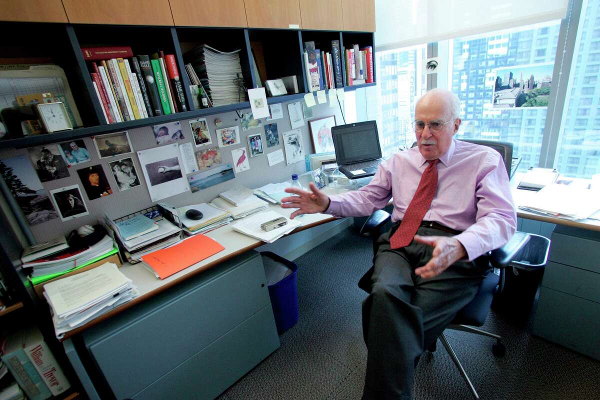 FILE - Author Roger Angell gestures during an interview at his office at the New Yorker magazine on April 4, 2006, in New York. Angell, a longtime New Yorker writer and editor, has died the New Yorker announced Friday, May 20, 2022. He was 101. Angell, the son of founding New Yorker editor Katharine White and stepson of E.B. White, contributed hundreds of essays and stories to the magazine over a 70-year career. (AP Photo/Mary Altaffer, File)