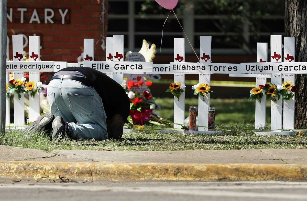 White crosses honor the 21 victims at Robb Elementary School on Wednesday, May 26, 2022, in Uvalde, Texas.