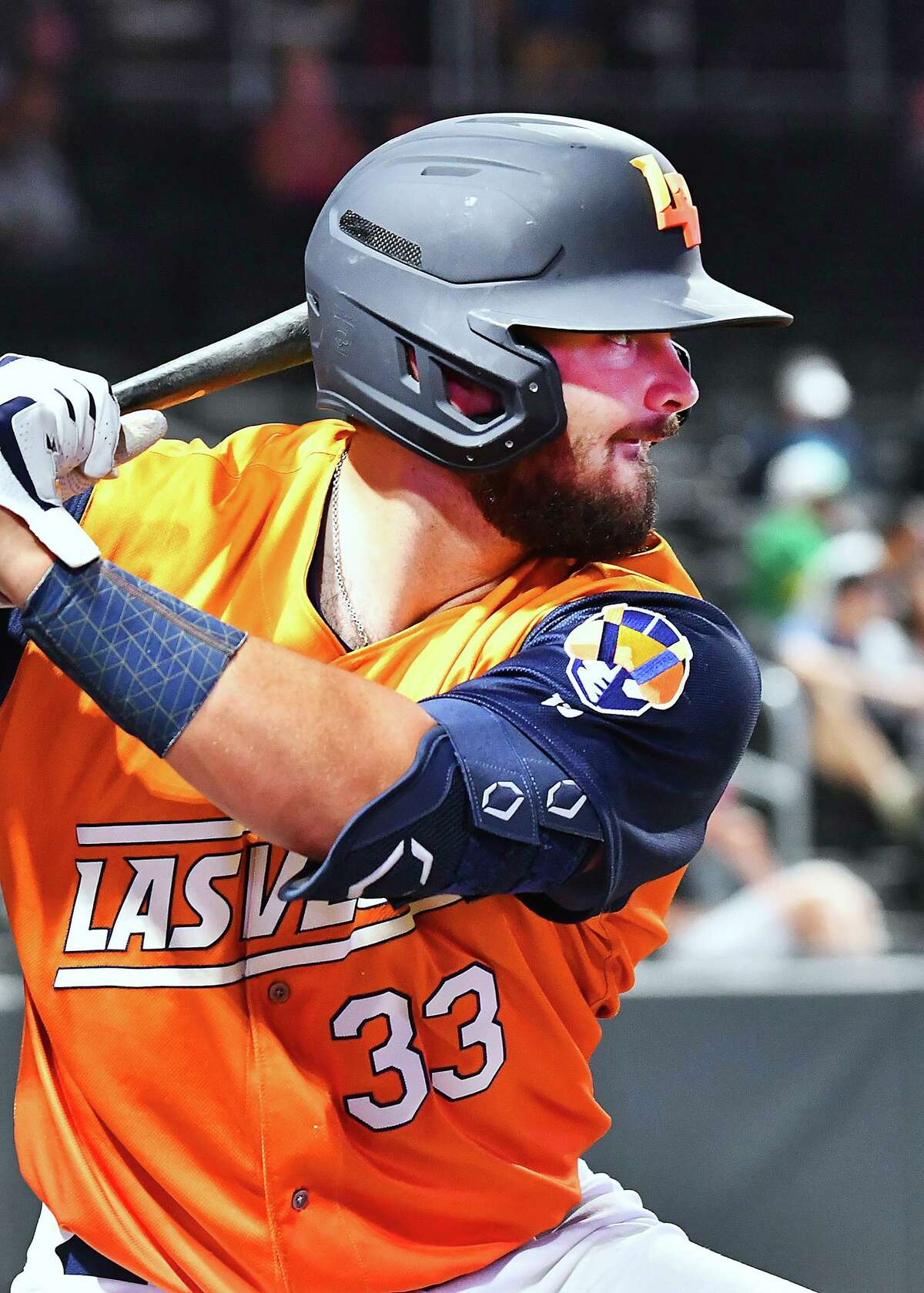Oakland Athletics catching prospect Shea Langeliers hits during a game with the Triple-A Las Vegas Aviators.