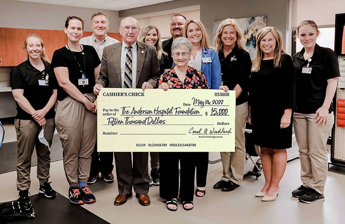 Carol and Harry Windland, foreground center, donated $15,000 to Anderson Hospital to assist in refreshing its rehabilitation gym after Carol was a patient there last year. 