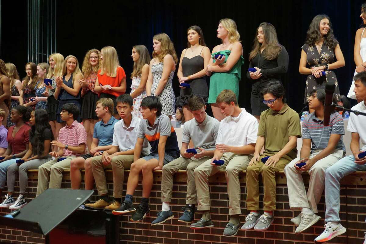 Spring Branch ISD athletes recognized for success in their sports wait for pictures on Monday, May 23 at Memorial High School.