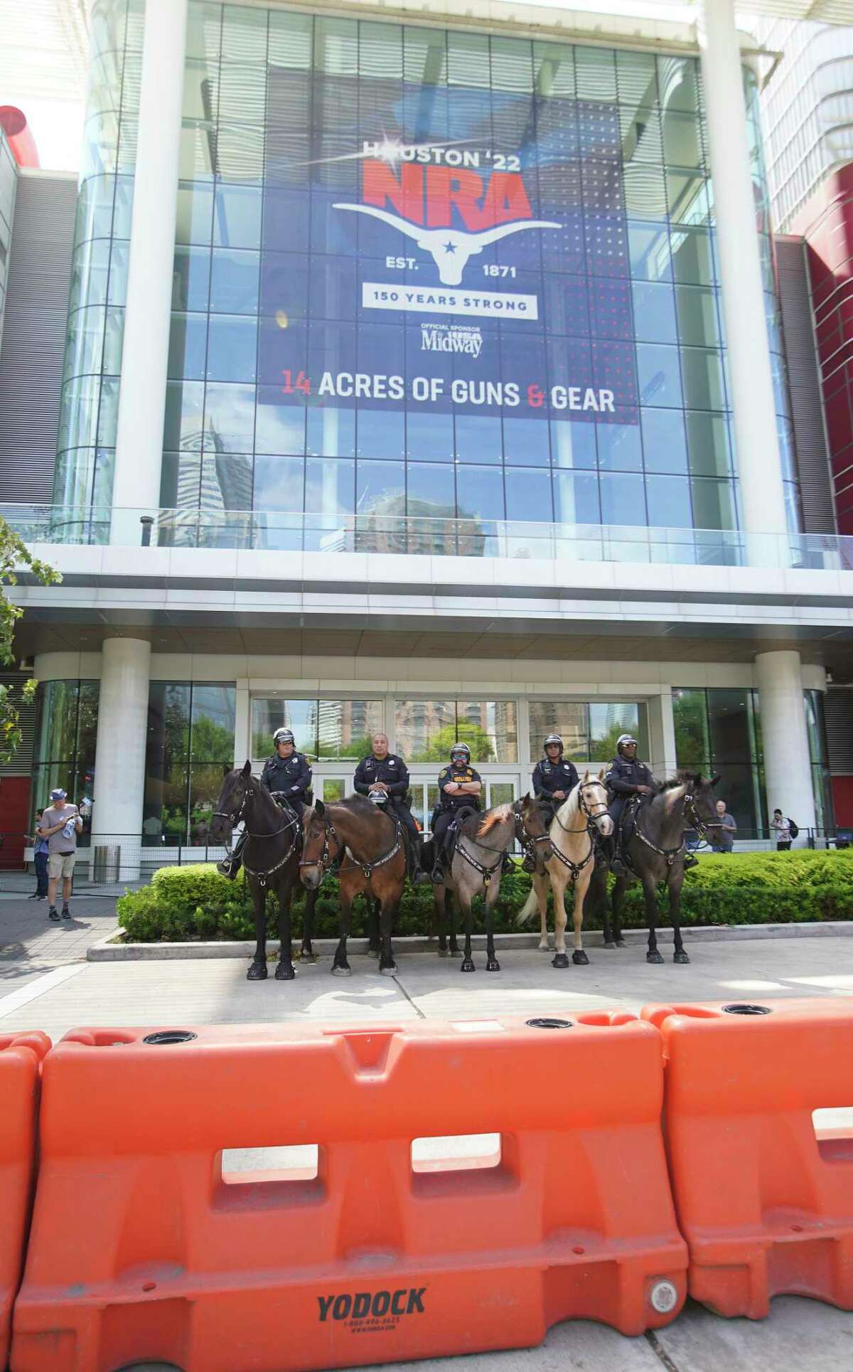 Houston NRA convention draws protesters at Discovery Green