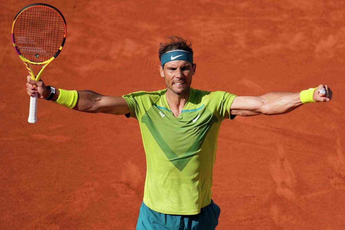 Spain's Rafael Nadal celebrates as he defeats Netherlands' Botic van de Zandschulp during their third round match of the French Open tennis tournament at the Roland Garros stadium Friday, May 27, 2022 in Paris. Nadal won 6-3, 6-2, 6-4.