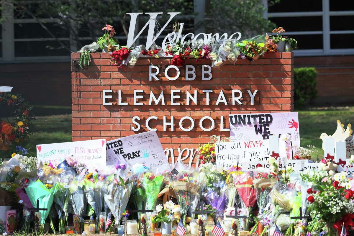 Flowers adorn a makeshift memorial for victims of Tuesday’s mass shooting at Robb Elementary School in Uvalde, Texas.