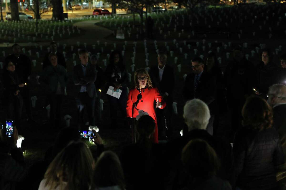 Amid 3,449 flower vases in Sue Bierman Park, former Rep. Gabby Giffords hosts a candlelight vigil to honor the lives lost to gun violence in San Francisco.