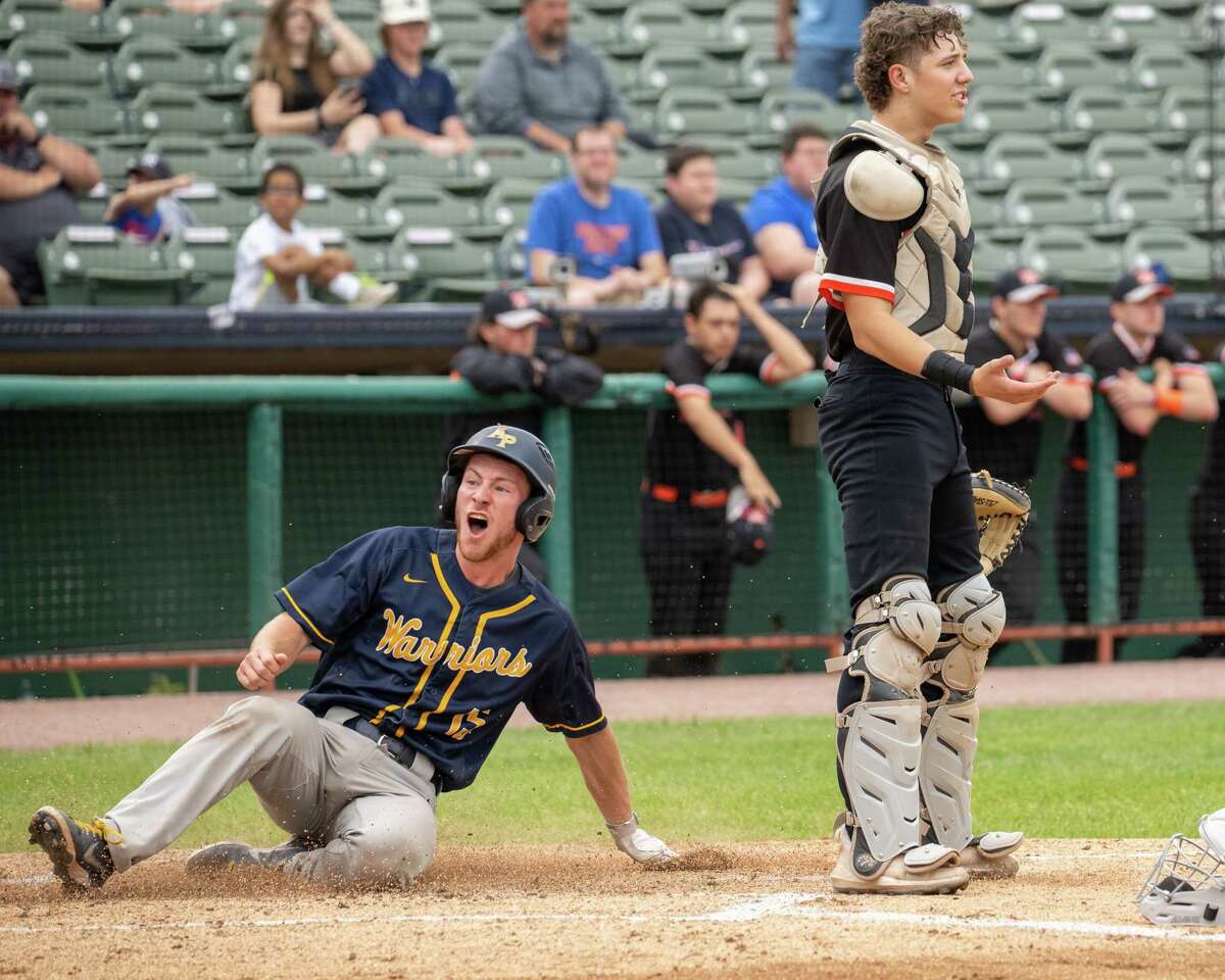 Mohonasen senior Jordan Vardine slides into home behind Averill Park catcher Steve Koval during the Class A finals at the Joseph L. Bruno Stadium on the Hudson Valley Community College campus in Troy, NY, on Friday, May 27, 2022. (Jim Franco/Special to the Times Union)