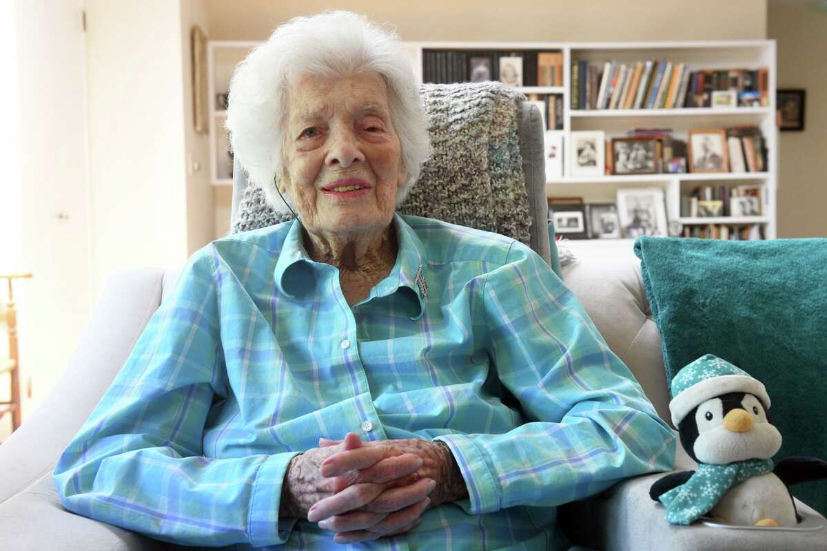 Jean Wells at home in Westport on May 24. Wells will be the grand marshal of the Westport Memorial Day Parade, which this year will fall on her 105th birthday. Wells served in the United States Coast Guard Women’s Reserve during World War II. Below,