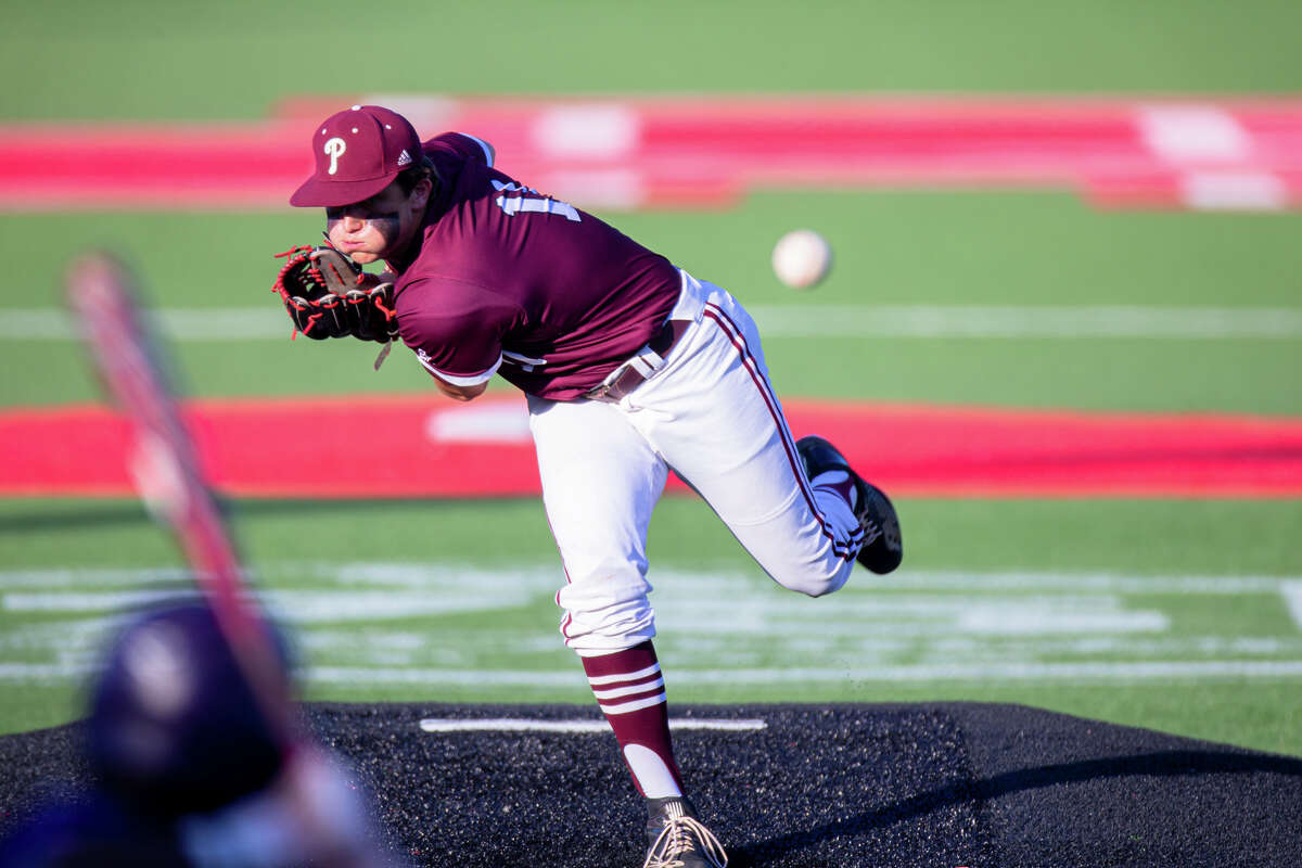 Pearland Oilers pitcher C Aden Ferraro (11) delivers the pitch in the first inning during a high school baseball playoffs Region III-6A semifinals, Game 2 Ridge Point vs. Pearland, Friday, May 27, 2022, at Schroeder Park, University of Houston. (Juan DeLeon/Contributor)