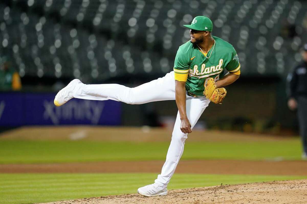 Oakland Athletics pitcher Domingo Acevedo during a baseball game against the Tampa Bay Rays in Oakland, Calif., Monday, May 2, 2022. (AP Photo/Jeff Chiu)
