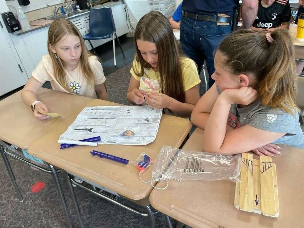 A Principles of Flight program was recently presented to the fifth grade class at the Booth Free Elementary School in Roxbury. The morning culminated in six groups, of three students, building their own ESTES Rocket’s.