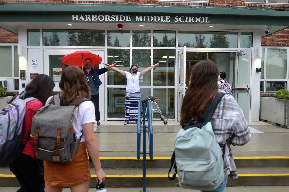 Milford board of education is requesting $26 million in capital improvement funds for Harborside Middle School in its $119 million capital improvement plan. Students arrive for the first day of class at Harborside Middle School, in Milford, Conn. Sept. 1, 2021.