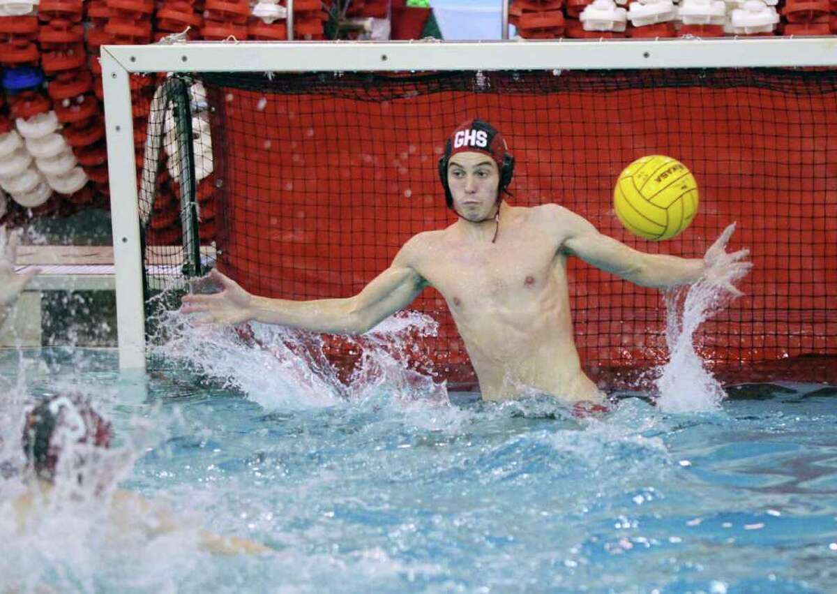 Greenwich High School water polo goalie James Kelly makes a stop during match against Phillips Exeter Academy at the GHS pool, during the 36th Cardinal Water Polo Tournament, Saturday afternoon, Oct. 2, 2010.