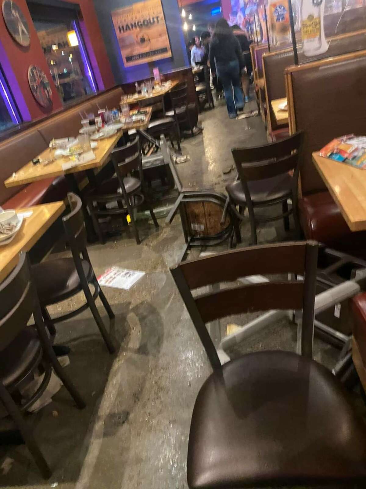 Pictured are photographs allegedly taken after a bar fight at Applebee's at the intersection of Bob Bullock Loop and International Drive on Friday, May 28, 2022. Unconfirmed reports and witness statements allege that a gunshot was fired inside the building, but LPD has so far said only that a bar fight occurred.