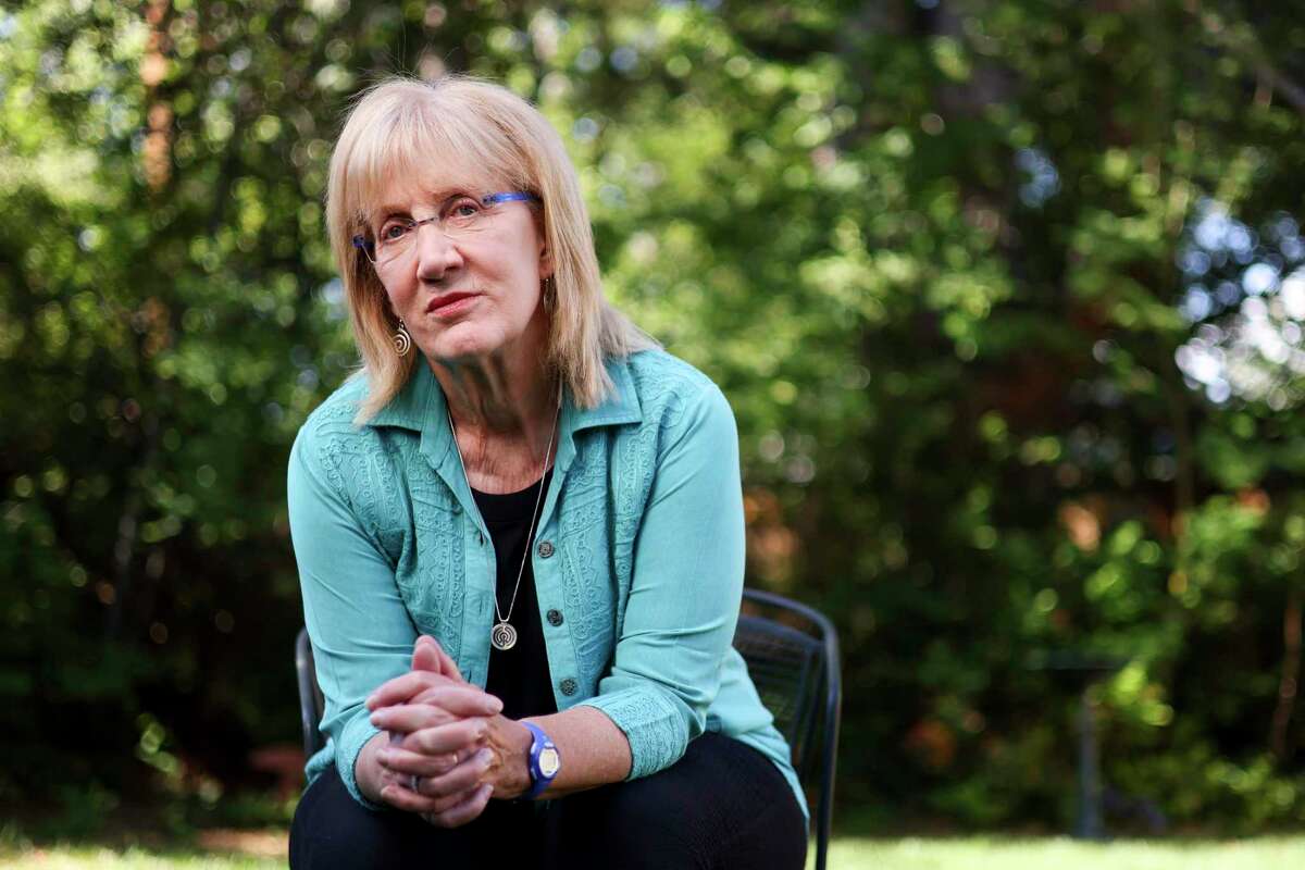 Christa Brown, who has for decades pleaded that Southern Baptist leaders do more to prevent abuse, sits for a portrait outside her home in Colorado on Thursday, May 26, 2022.