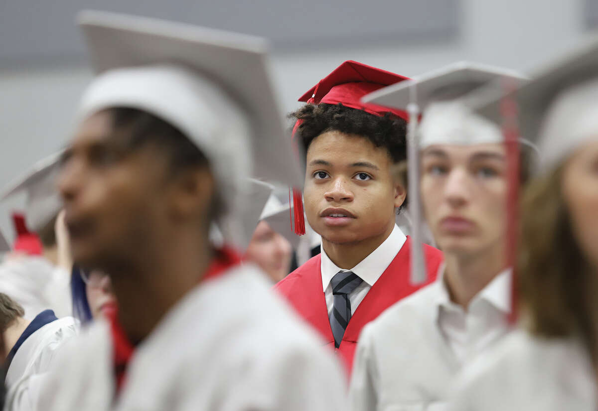 Alton High School returns to gymnasium for graduation