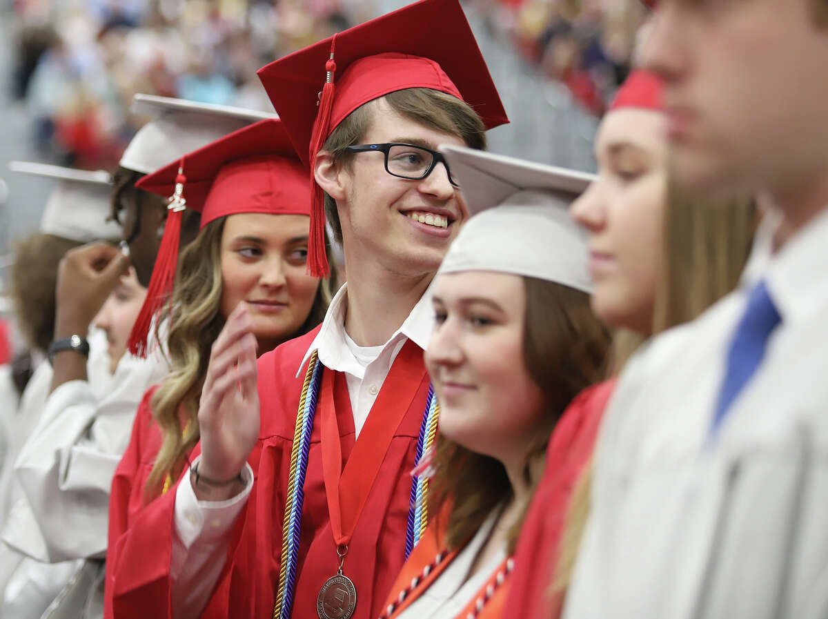 Alton High School returns to gymnasium for graduation