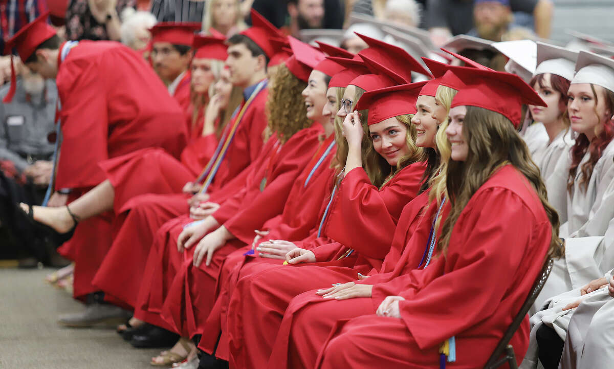 Alton High School returns to gymnasium for graduation