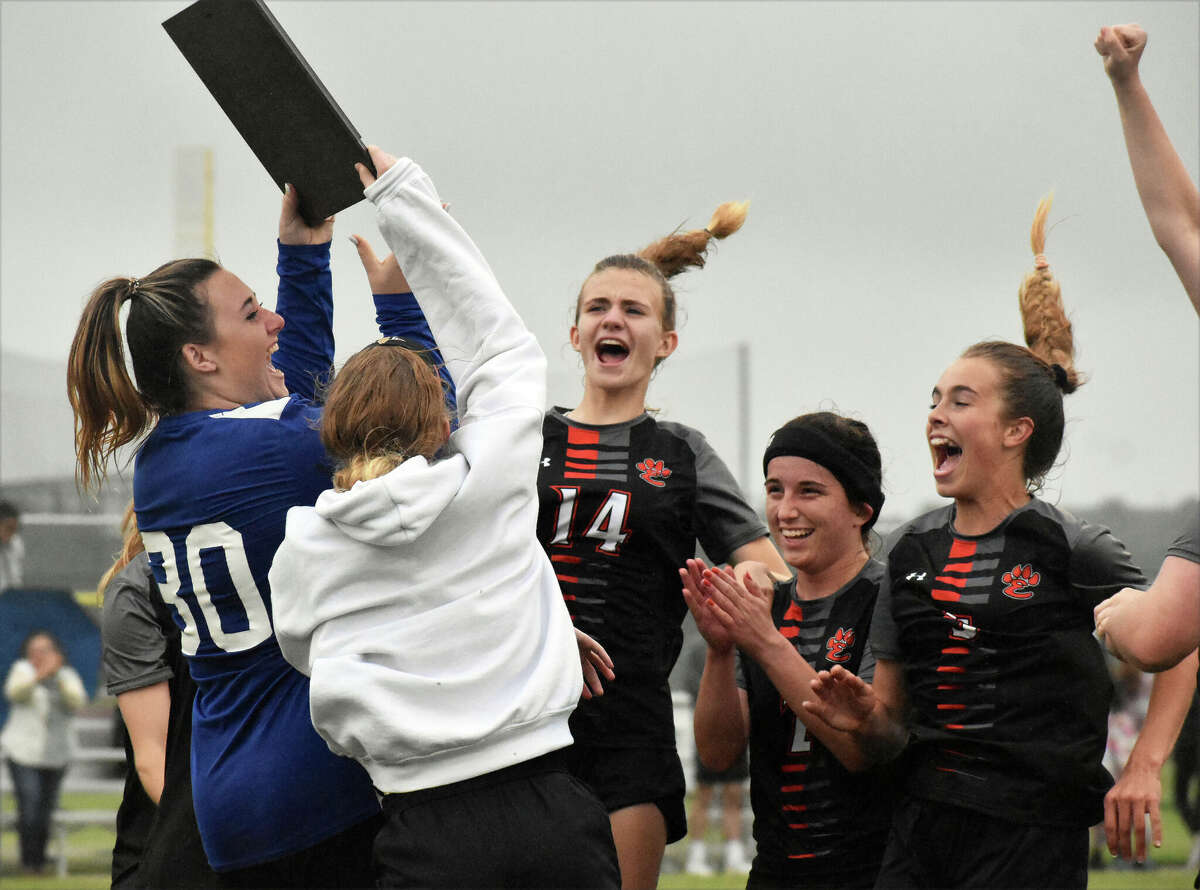 Edwardsville celebrates after beating Normal Community on Friday in the Class 3A Normal Community Sectional championship game in Normal.