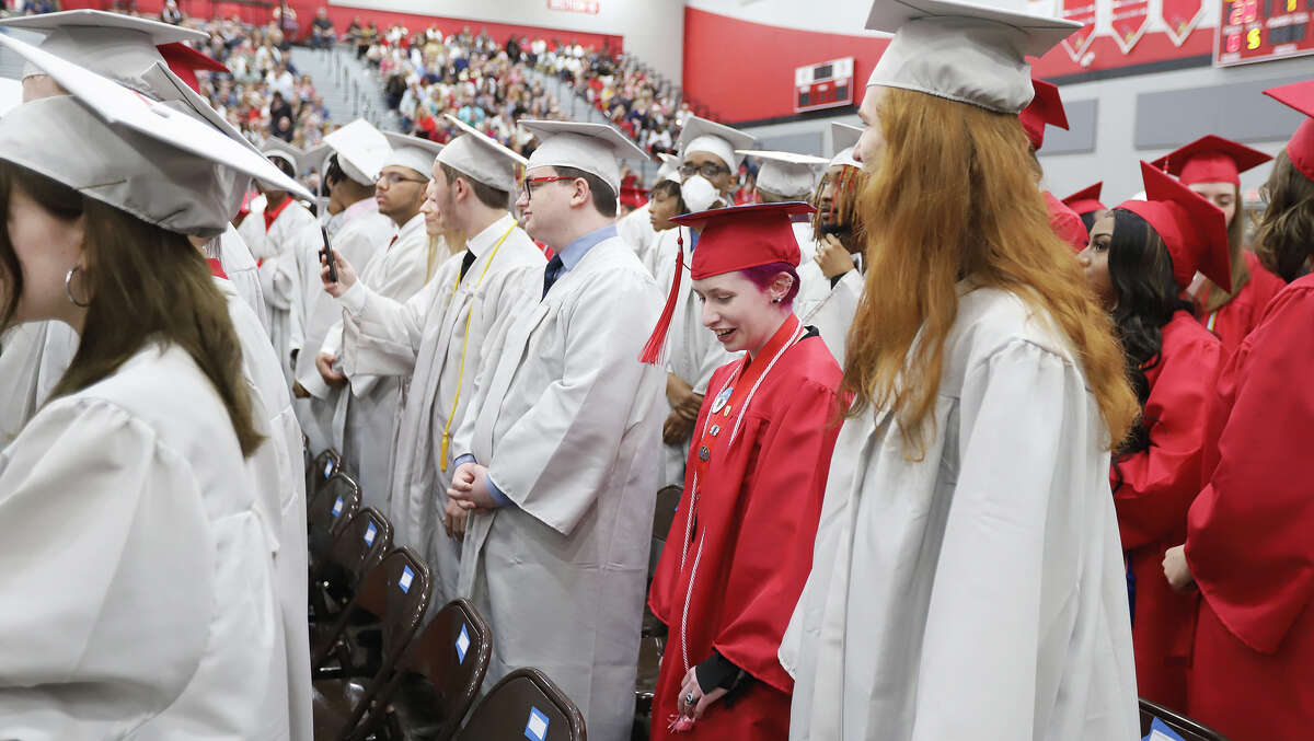 Alton High School returns to gymnasium for graduation