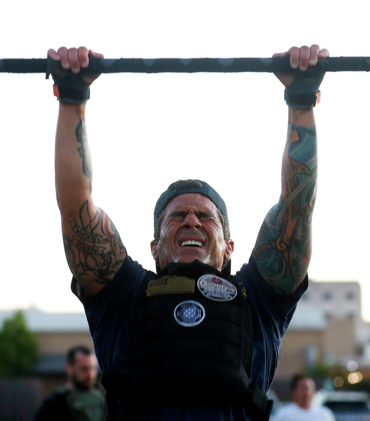 Joey Lopez works through his last 100 pull ups as participants compete in the inaugural Murph Challenge, Saturday, May 28, 2022, in Conroe. The challenge honors Michael P. Murphy’s sacrifice and memory, part of the Lone Survivor squad with Marcus Lutrell, by following his daily workout of a one-mile run, 100 pull ups, 200 push ups and 300 squats followed by another one-mile run.